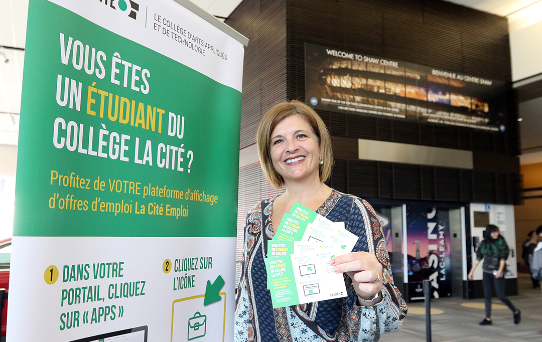 A La Cité representative poses in the Networking Career Café.