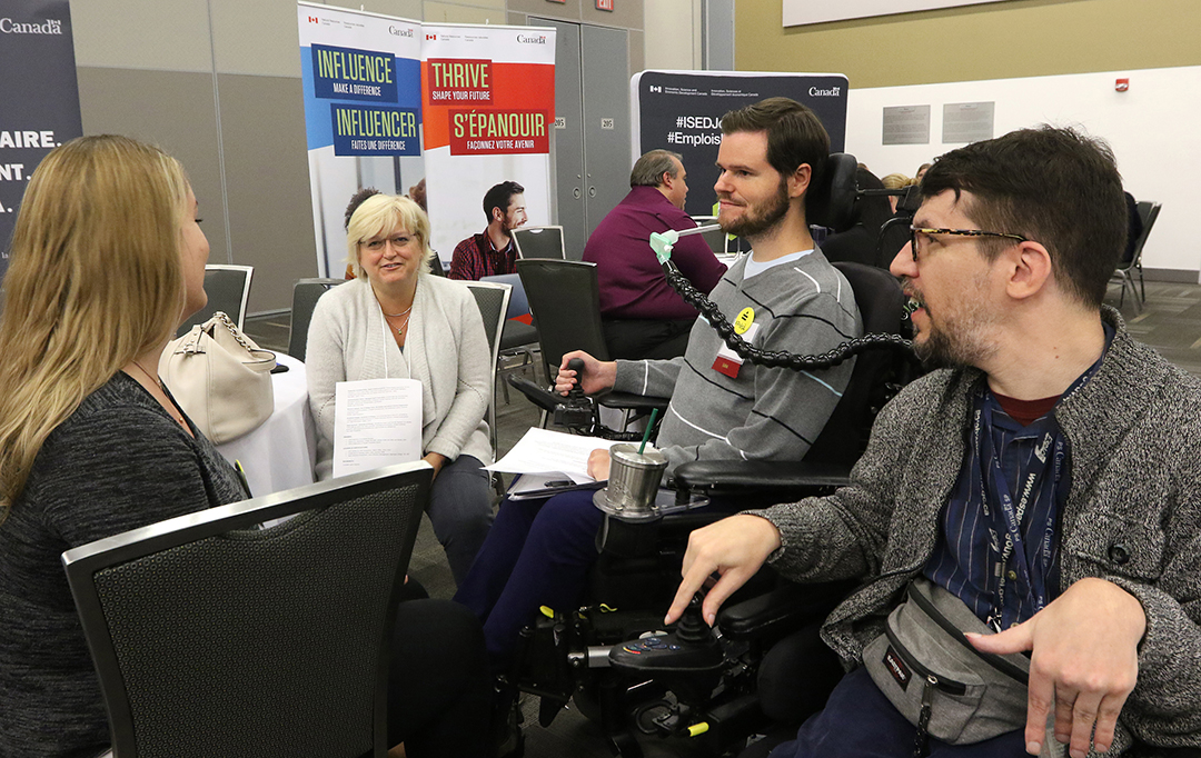 Students with mobility aids navigate the accessible PSC event.